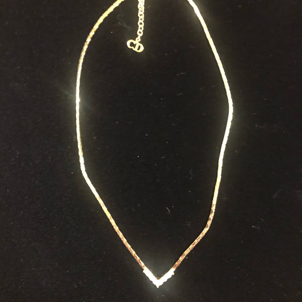 Classic disco era vintage Christian Dior
necklace with rhinestone “vee”